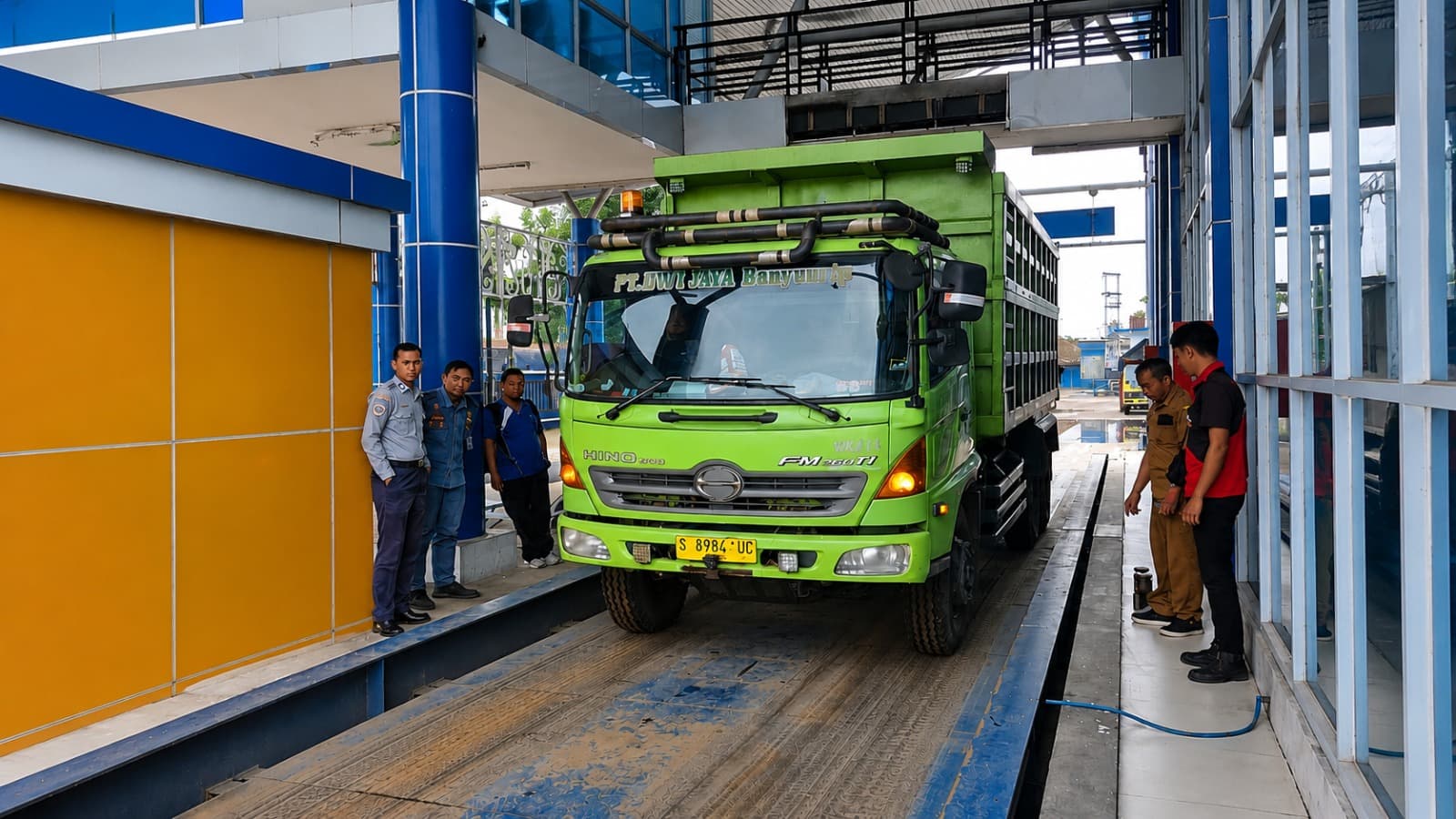 Technician performing static weighbridge calibration to ensure accurate vehicle weighing and prevent revenue leakage in industrial operations. Technician performing static weighbridge calibration to ensure accurate vehicle weighing and prevent revenue leakage in industrial operations.